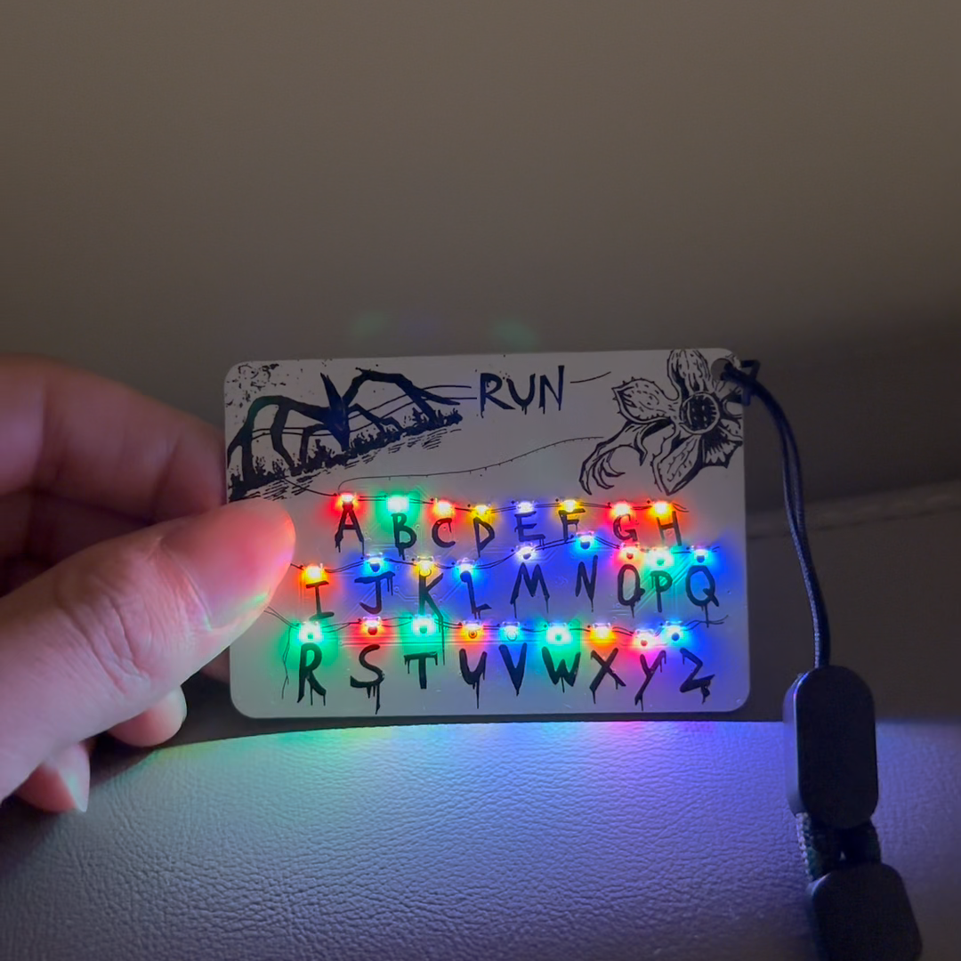 Stranger Things Run Card Keychain